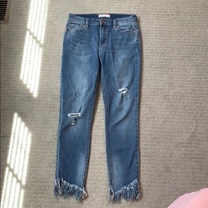 Free people distressed jeans with fringe bottom